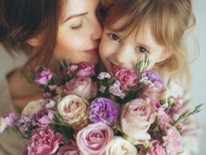A joyful mother and daughter sharing a tender moment, holding a bouquet of pink and purple flowers—perfect for Mother's Day.