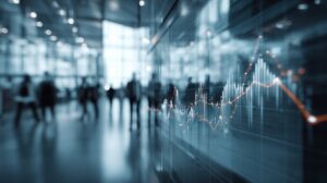 Blurred business office silhouettes with overlay of stock market graphs showing dynamic financial trends.