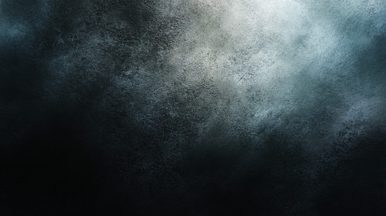 Blurred black vintage texture with subtle gradient lighting, ideal for use as a moody background in graphic design and creative projects.