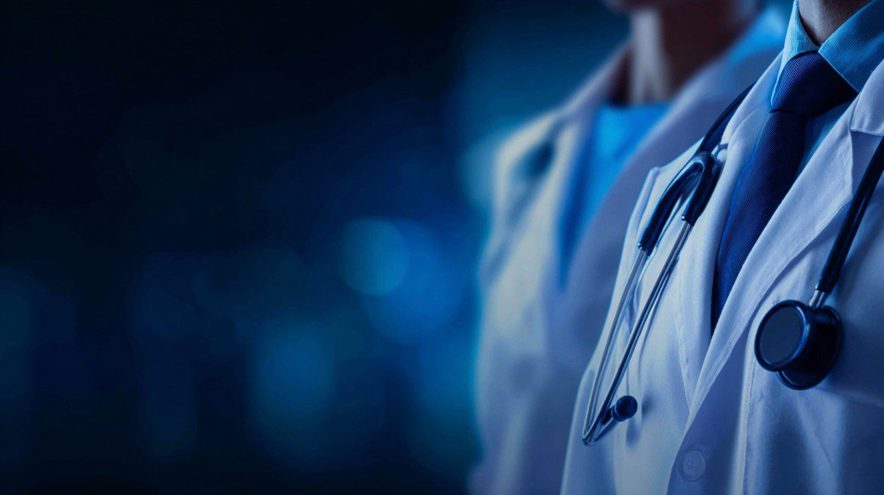 Close-up of trusted medical professionals wearing white coats and stethoscopes, with a blurred blue background symbolizing healthcare trust.