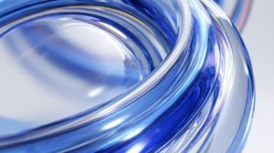 Close-up abstract design of intertwined blue glass rings with reflections and light effects, symbolizing innovation and modern technology.