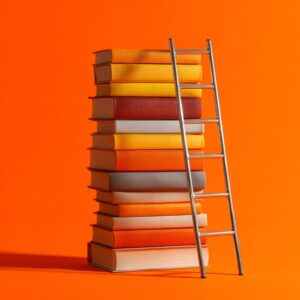 Stack of colorful books with a ladder leaning on it, symbolizing the concept of learning, growth, and the pursuit of knowledge.