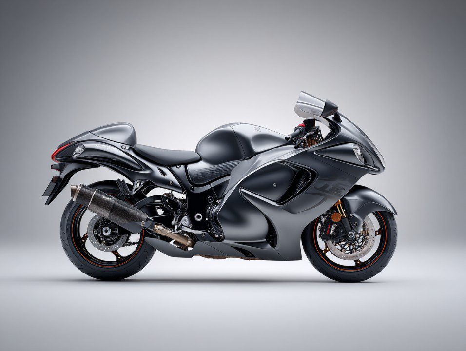 Black sport motorcycle isolated on a clean gray background, highlighting sleek design and high-performance styling.